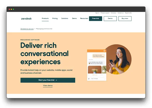 A screenshot of the Zendesk website, showcasing a messaging software solution. The headline reads "Deliver rich conversational experiences" and highlights the ability to provide instant help on websites, mobile apps, social media, and business channels. The website encourages users to start a free trial or view a demo of the messaging software, which likely includes AI-powered features for enhanced customer interactions.
